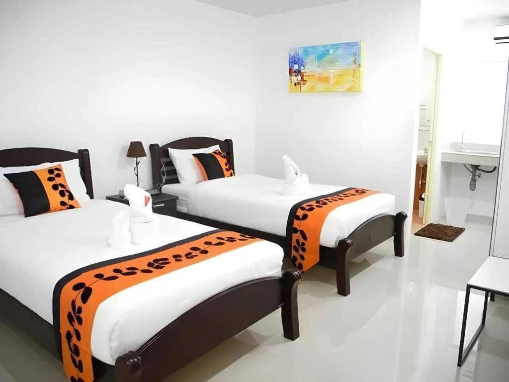 Bed in Phet Cha-am Plaza&Resort