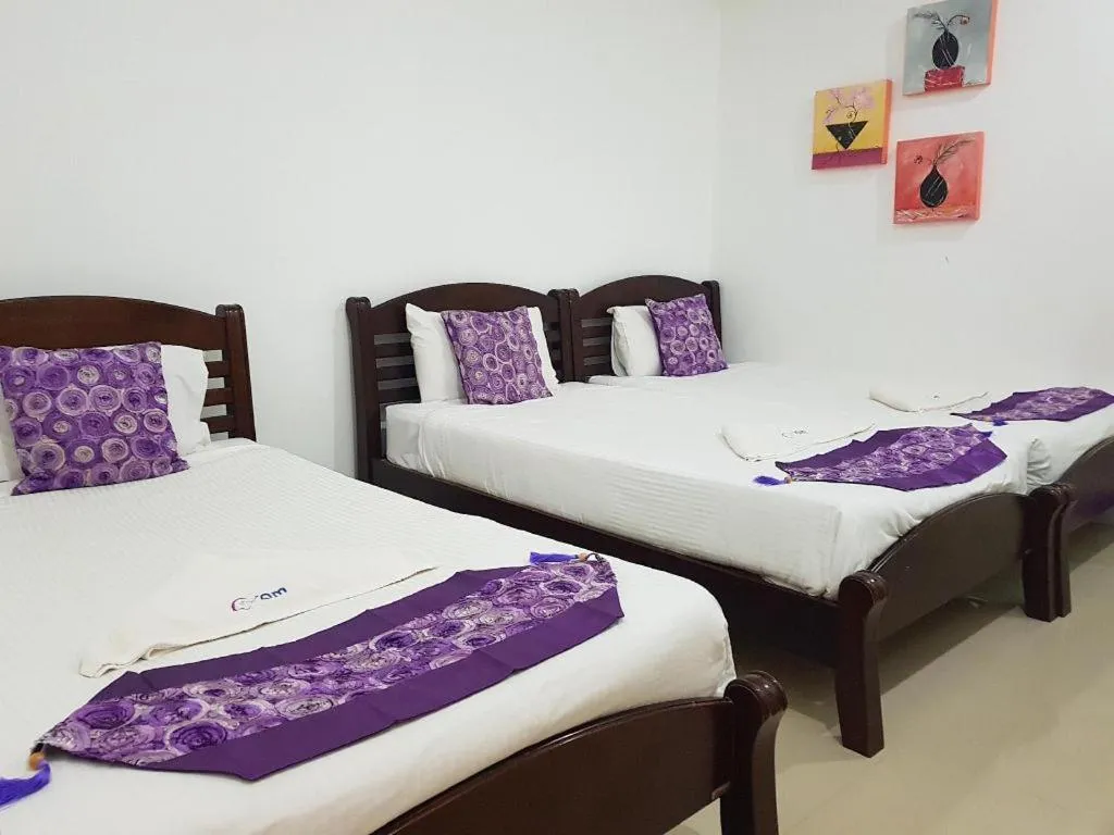 Bed in Phet Cha-am Plaza&Resort