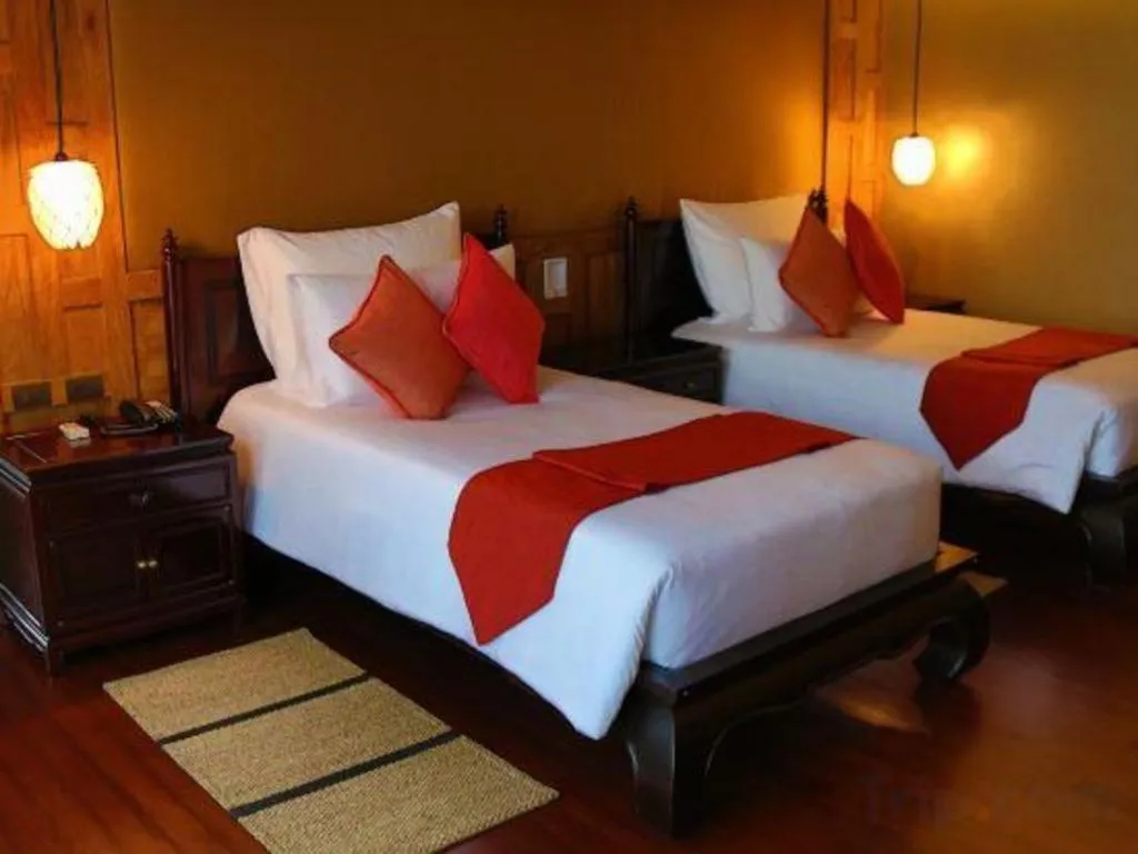 Bed in Baan Souchada Resort & Spa