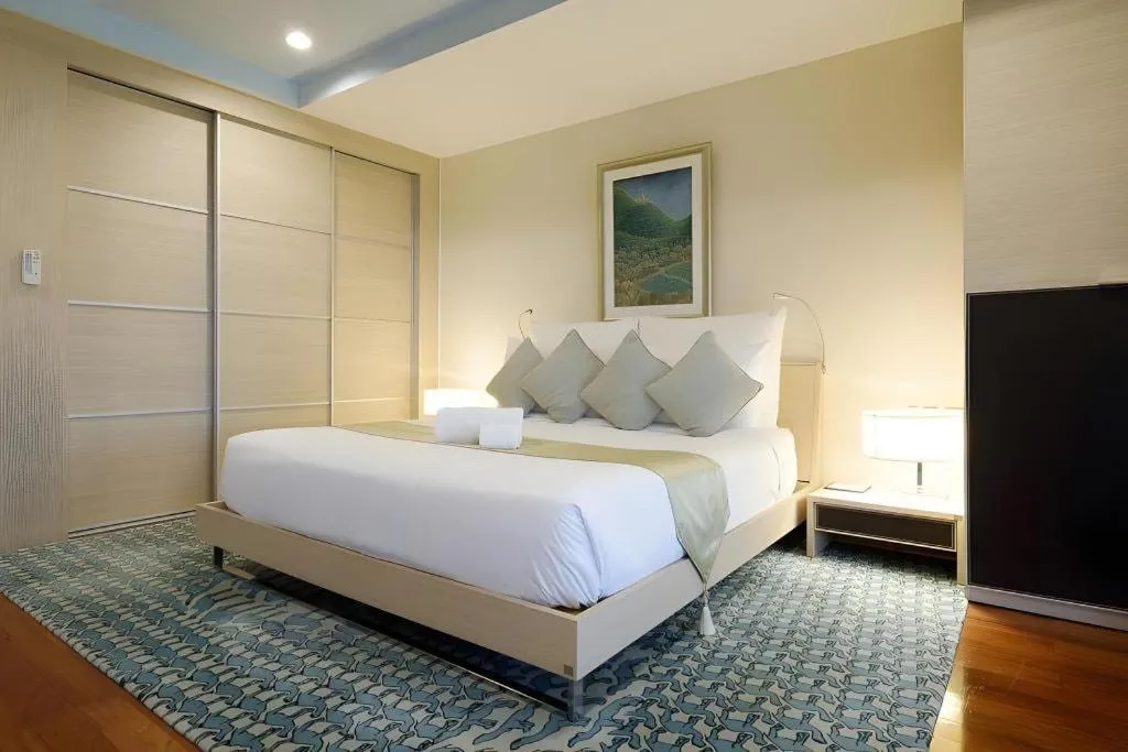 Bed in Baan Souchada Resort & Spa