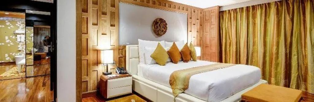 Bed in Baan Souchada Resort & Spa