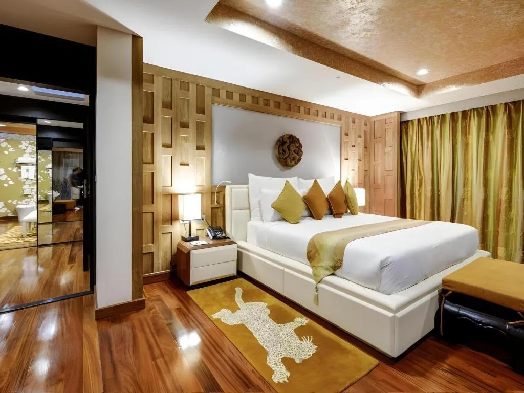 Bed in Baan Souchada Resort & Spa