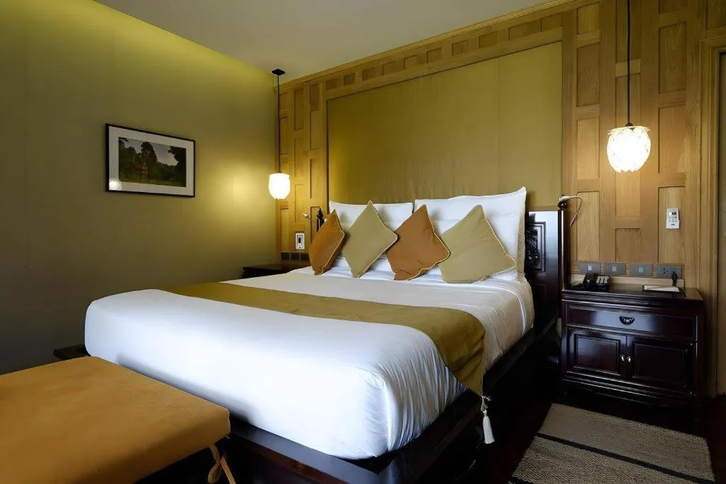 Bed in Baan Souchada Resort & Spa