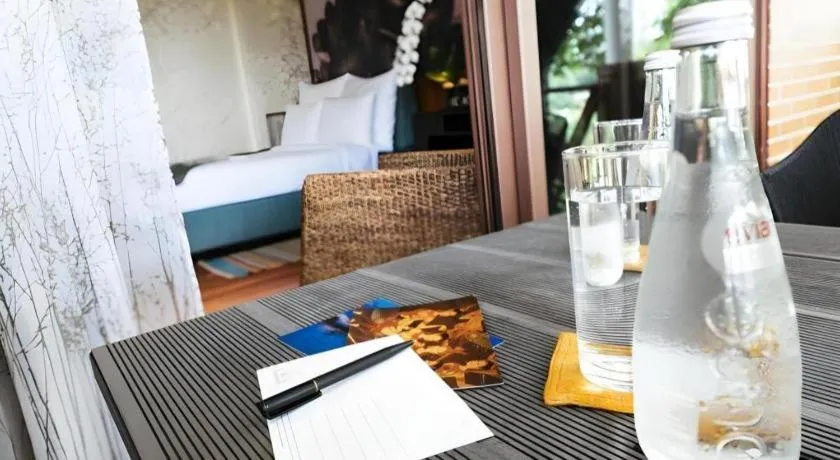 Bed in Baan Souchada Resort & Spa