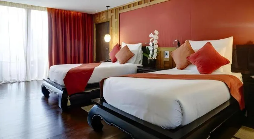 Bed in Baan Souchada Resort & Spa