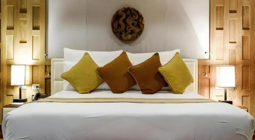 Bed in Baan Souchada Resort & Spa