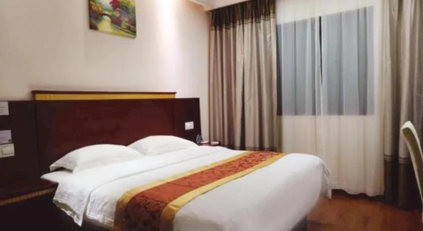 Bed in GreenTree Inn Shanghai Minhang Development Zone Subway Station Business Hotel