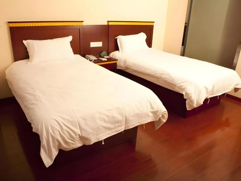 Bed in GreenTree Inn Shanghai Minhang Development Zone Subway Station Business Hotel