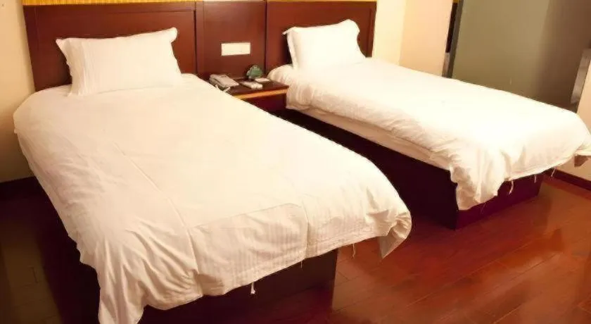 Bed in GreenTree Inn Shanghai Minhang Development Zone Subway Station Business Hotel