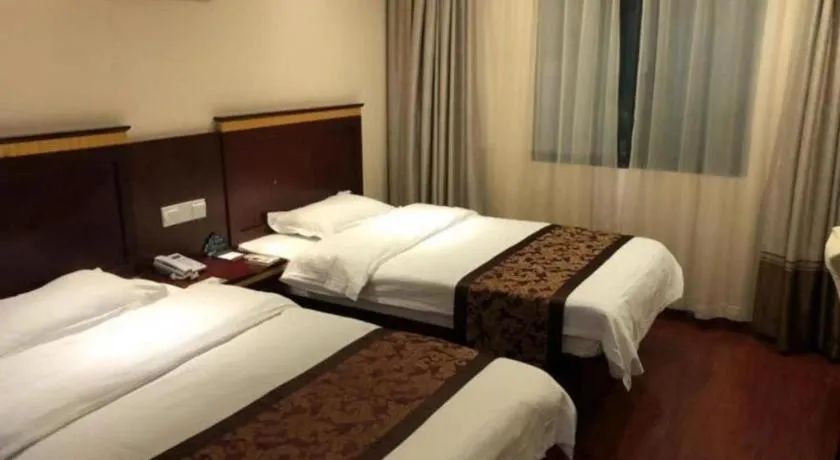 Bed in GreenTree Inn Shanghai Minhang Development Zone Subway Station Business Hotel