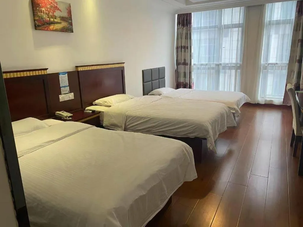 Bed in GreenTree Inn Shanghai Minhang Development Zone Subway Station Business Hotel