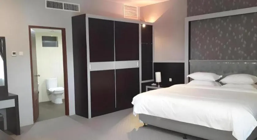 Bed in Raz Hotel and Convention