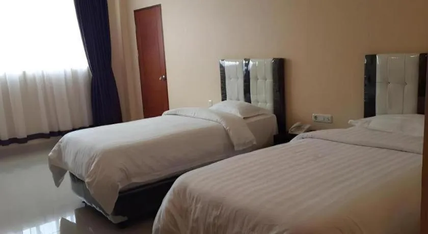 Bed in Raz Hotel and Convention