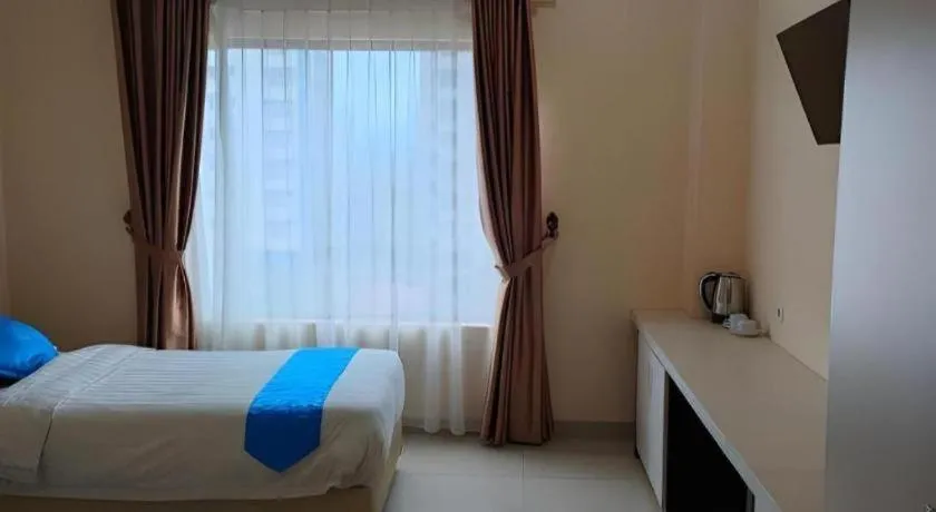 Bed in Raz Hotel and Convention