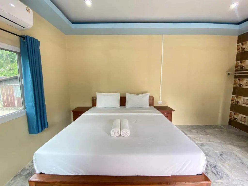 Bed in Hihotel Saraburi