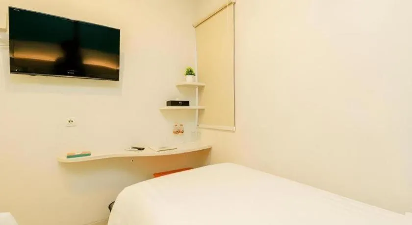 Bed in Makassar Beach Inn