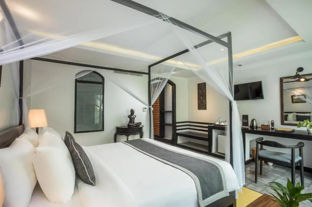 Bed in The Grand Cyclo Boutique Suite & Spa