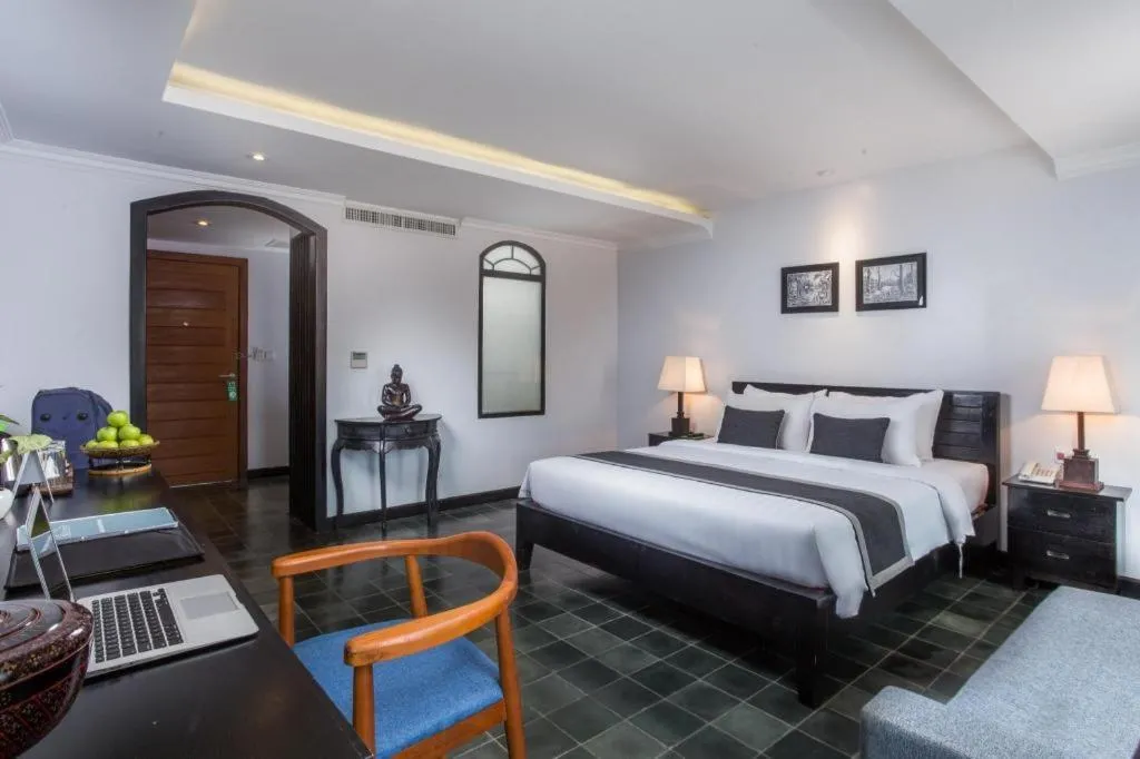 Bed in The Grand Cyclo Boutique Suite & Spa