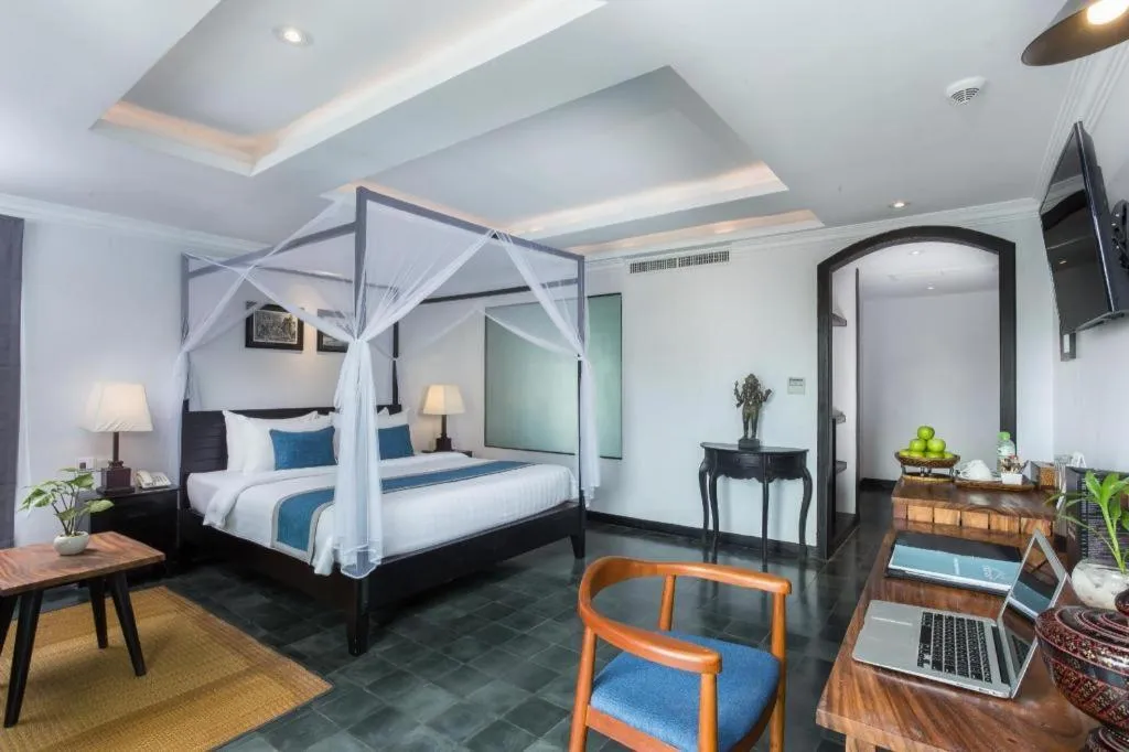 Bed in The Grand Cyclo Boutique Suite & Spa