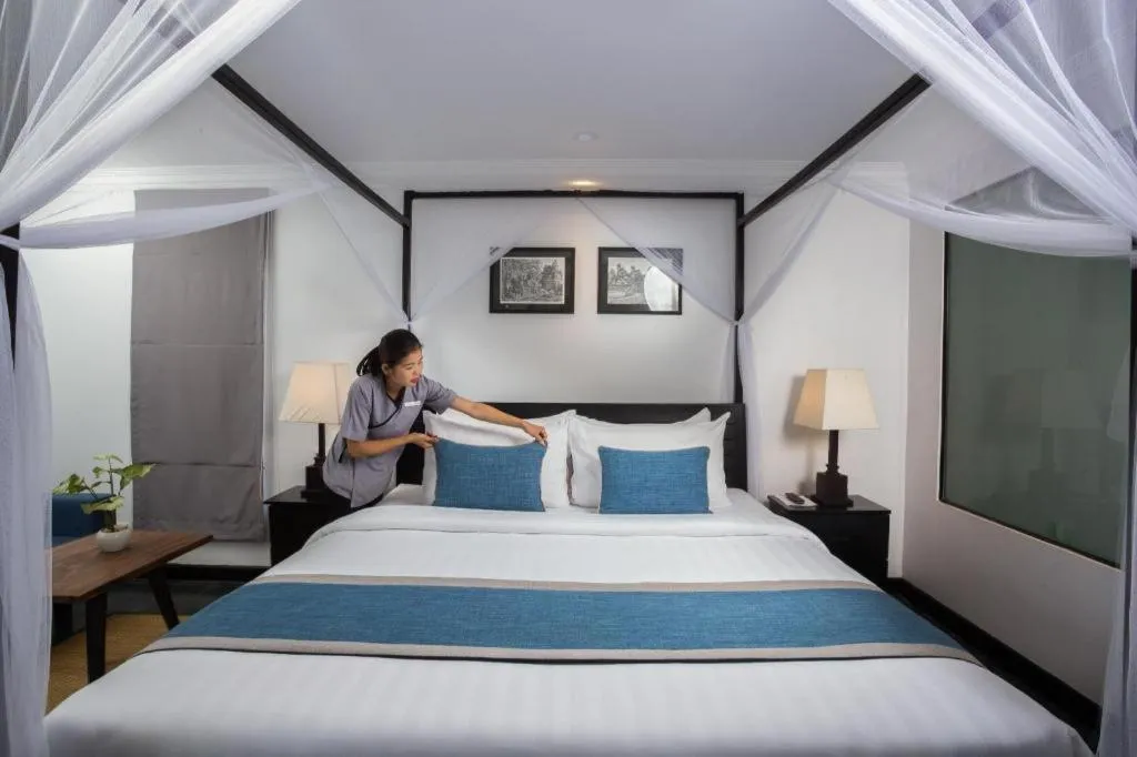 Bed in The Grand Cyclo Boutique Suite & Spa