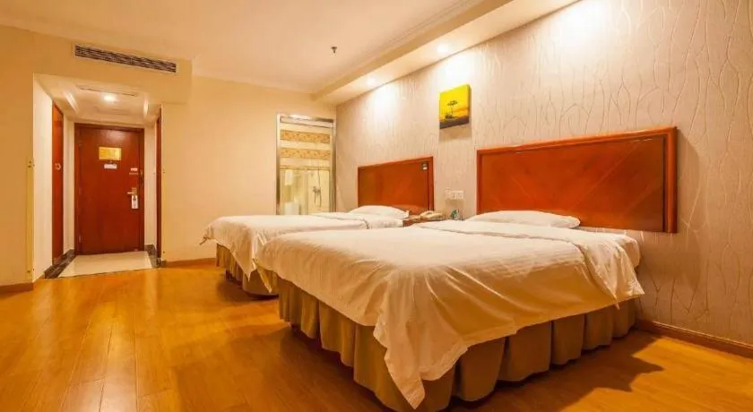 Bed in GreenTree Inn Kunshan Shimao Plaza Business Hotel