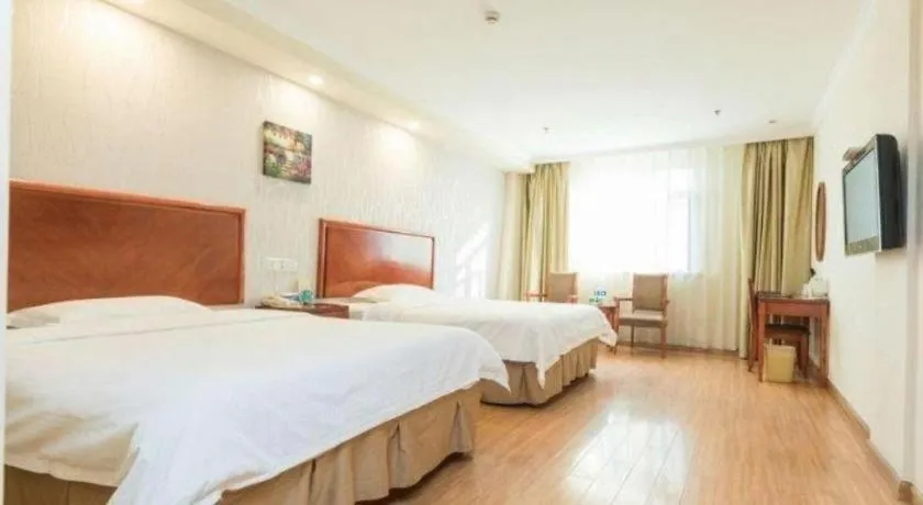 Bed in GreenTree Inn Kunshan Shimao Plaza Business Hotel