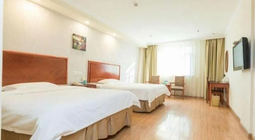 Bed in GreenTree Inn Kunshan Shimao Plaza Business Hotel