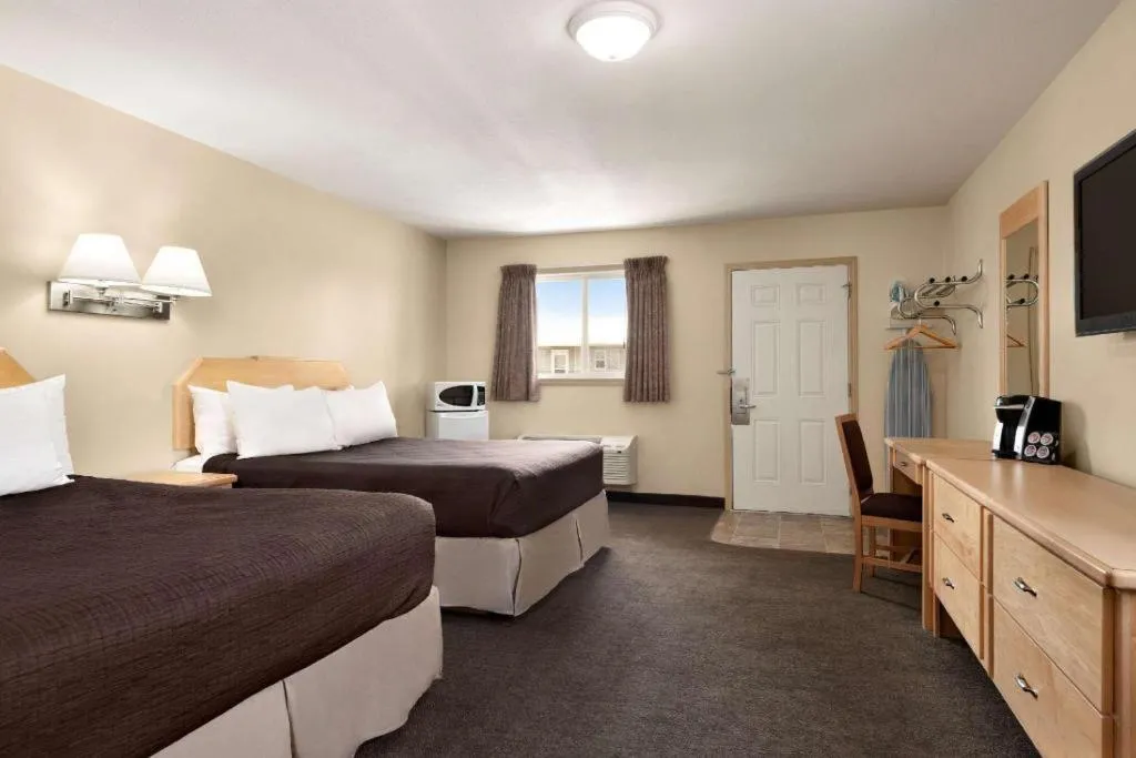 Bed in Thriftlodge Moose Jaw