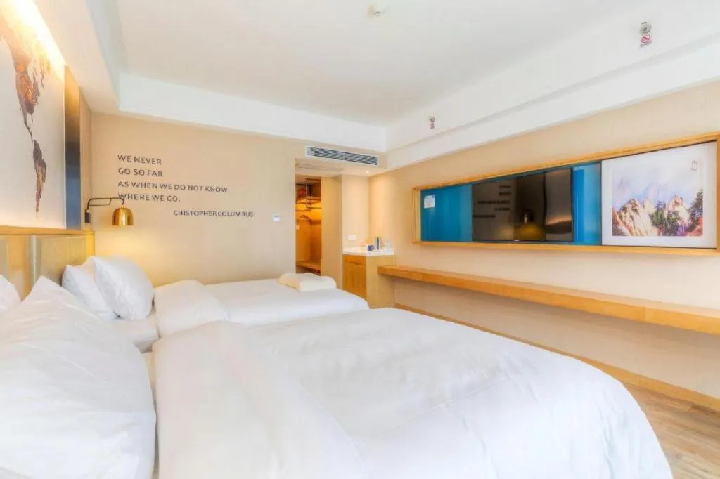 Bed in Kyriad Marvelous Hotel·Xi'an North High-speed Railway Station