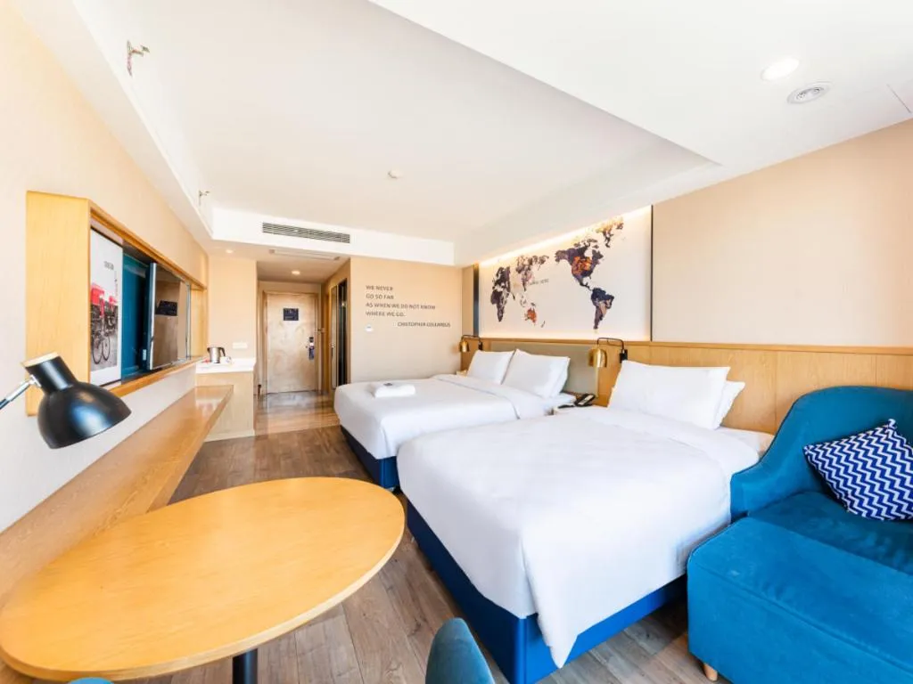 Bed in Kyriad Marvelous Hotel·Xi'an North High-speed Railway Station