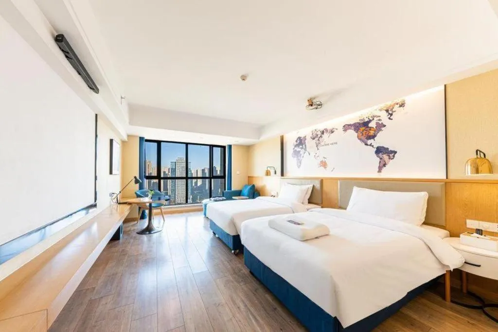 Bed in Kyriad Marvelous Hotel·Xi'an North High-speed Railway Station