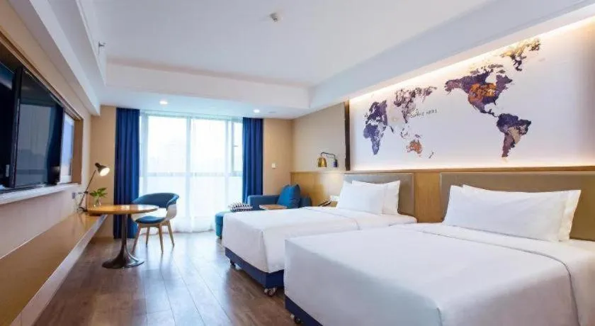 Bed in Kyriad Marvelous Hotel·Xi'an North High-speed Railway Station