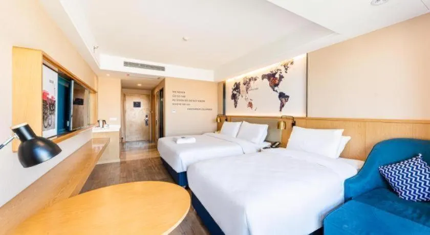 Bed in Kyriad Marvelous Hotel·Xi'an North High-speed Railway Station