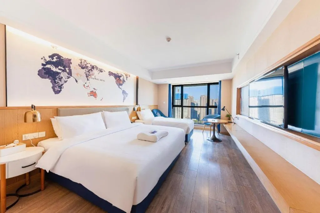 Bed in Kyriad Marvelous Hotel·Xi'an North High-speed Railway Station