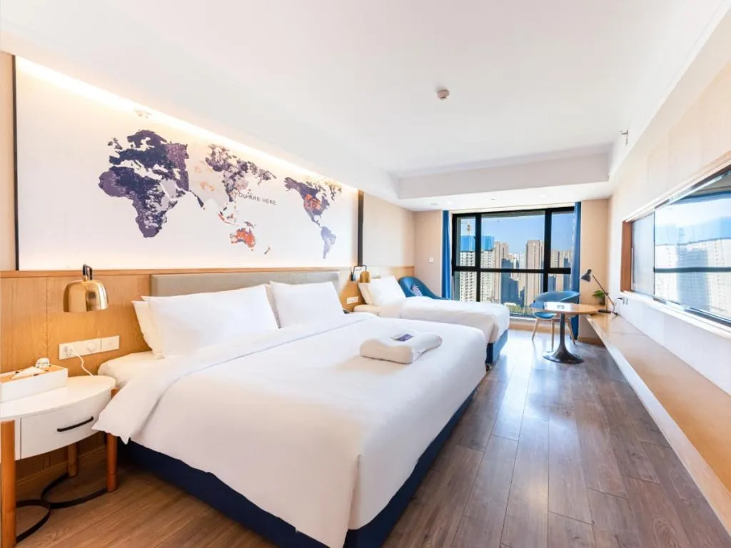 Bed in Kyriad Marvelous Hotel·Xi'an North High-speed Railway Station