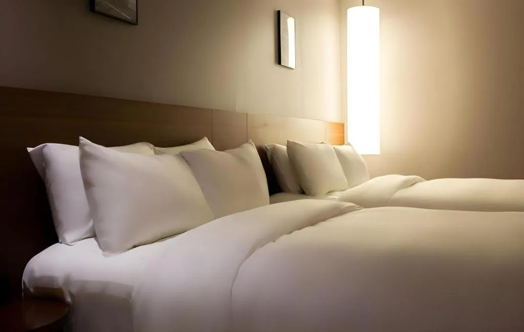 Bed in Top Cloud Hotel Iksan