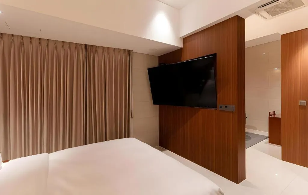 Bed in Top Cloud Hotel Iksan