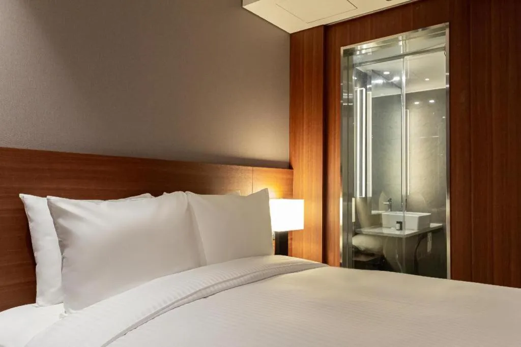 Bed in Top Cloud Hotel Iksan