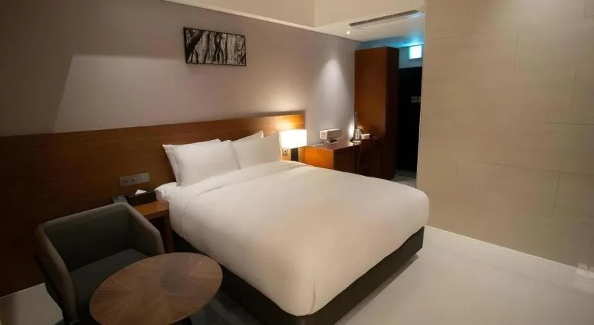 Bed in Top Cloud Hotel Iksan