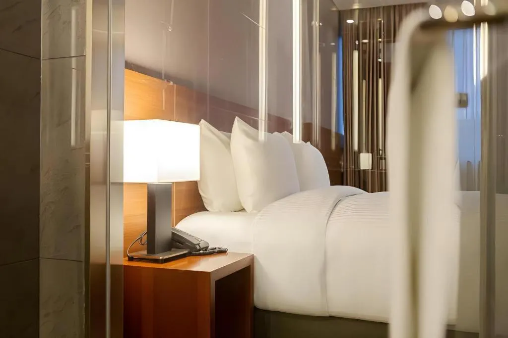 Bed in Top Cloud Hotel Iksan