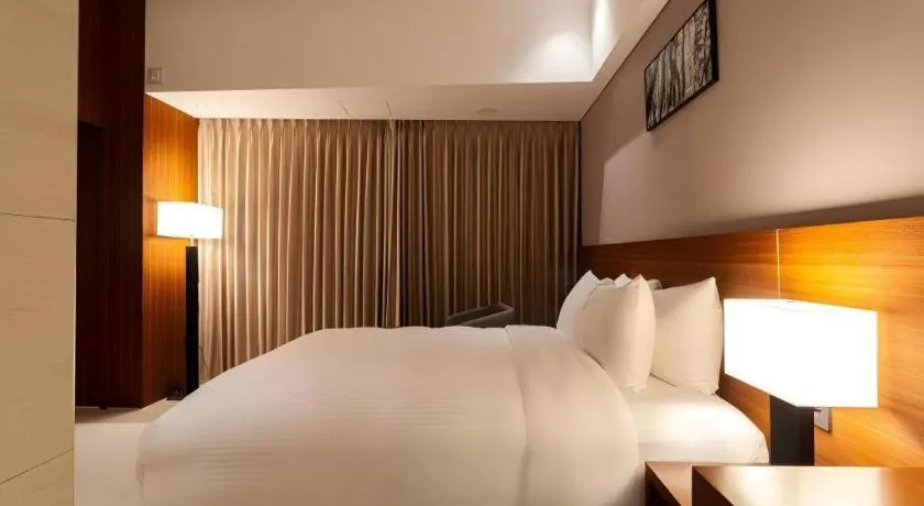 Bed in Top Cloud Hotel Iksan