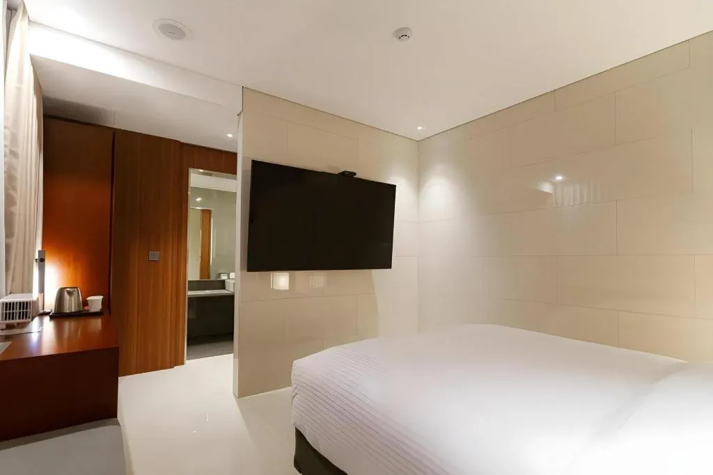 Bed in Top Cloud Hotel Iksan