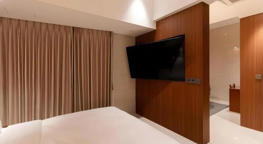 Bed in Top Cloud Hotel Iksan