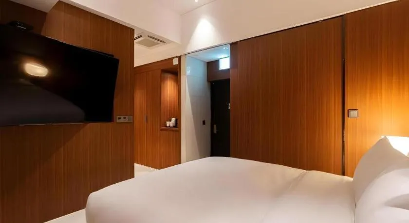 Bed in Top Cloud Hotel Iksan