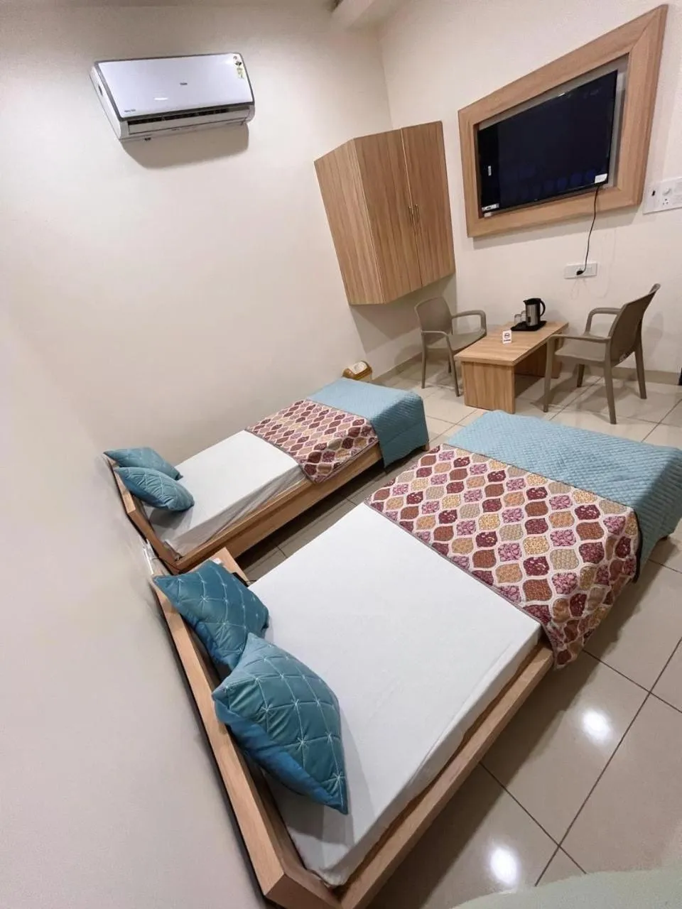 Bed in Hotel Rajvi Residency A Unit Of Jas Hotels And Resorts