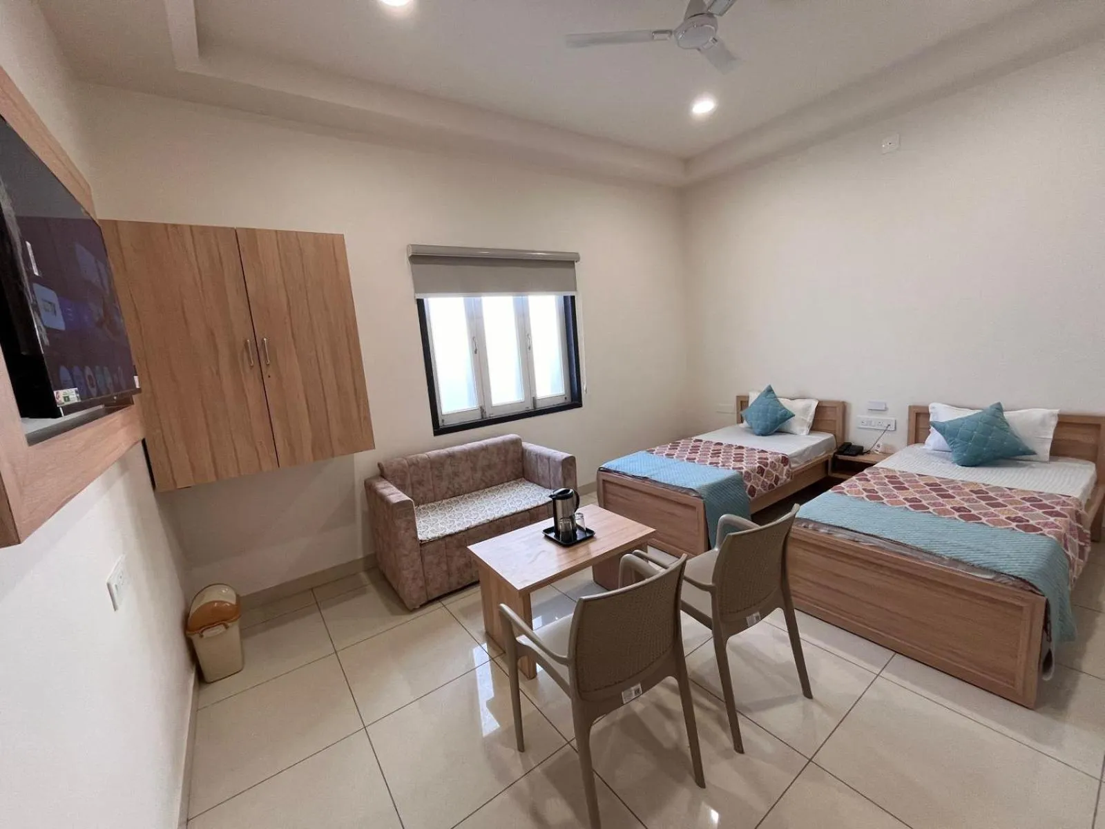 TV and multimedia, Bed in Hotel Rajvi Residency A Unit Of Jas Hotels And Resorts