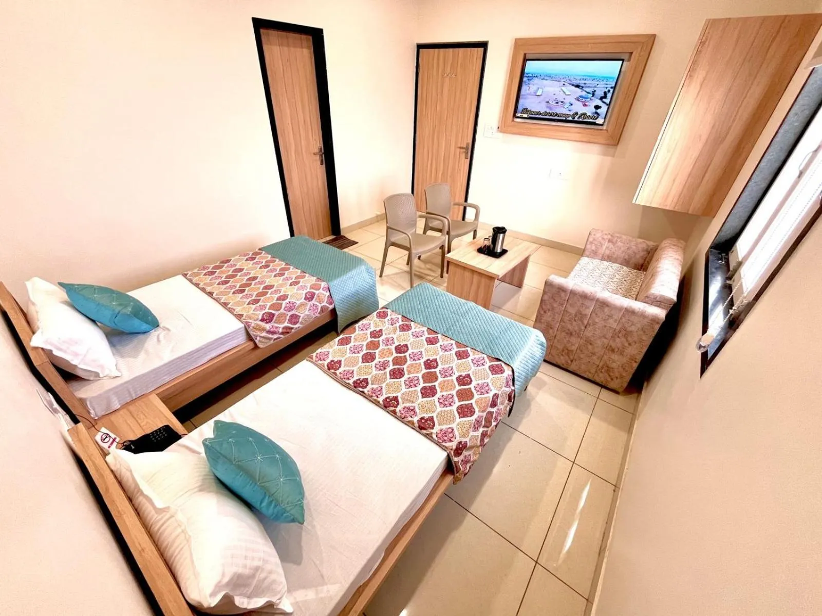 Bed in Hotel Rajvi Residency A Unit Of Jas Hotels And Resorts