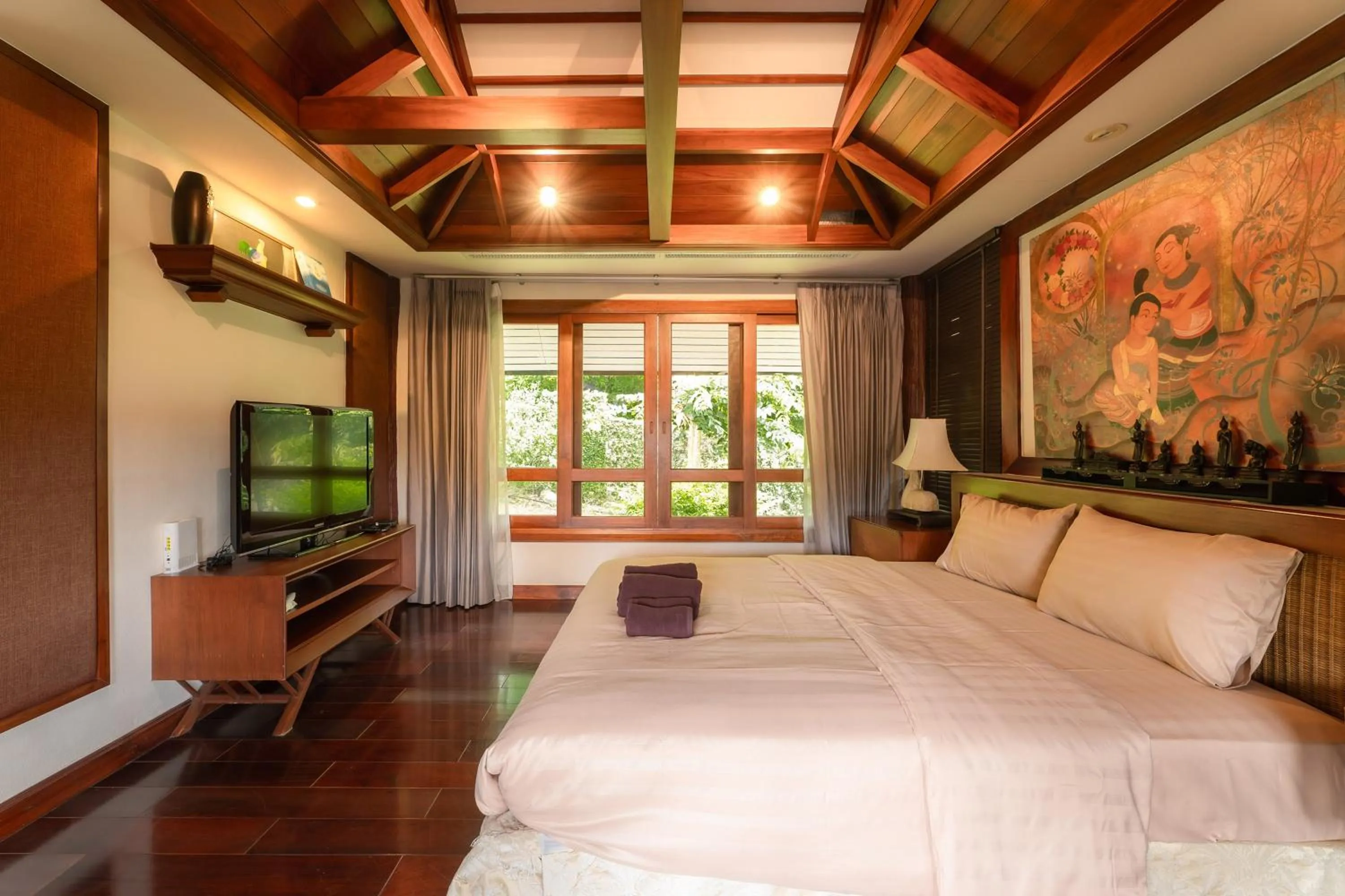 Bed in Guru Resort Chiang Mai