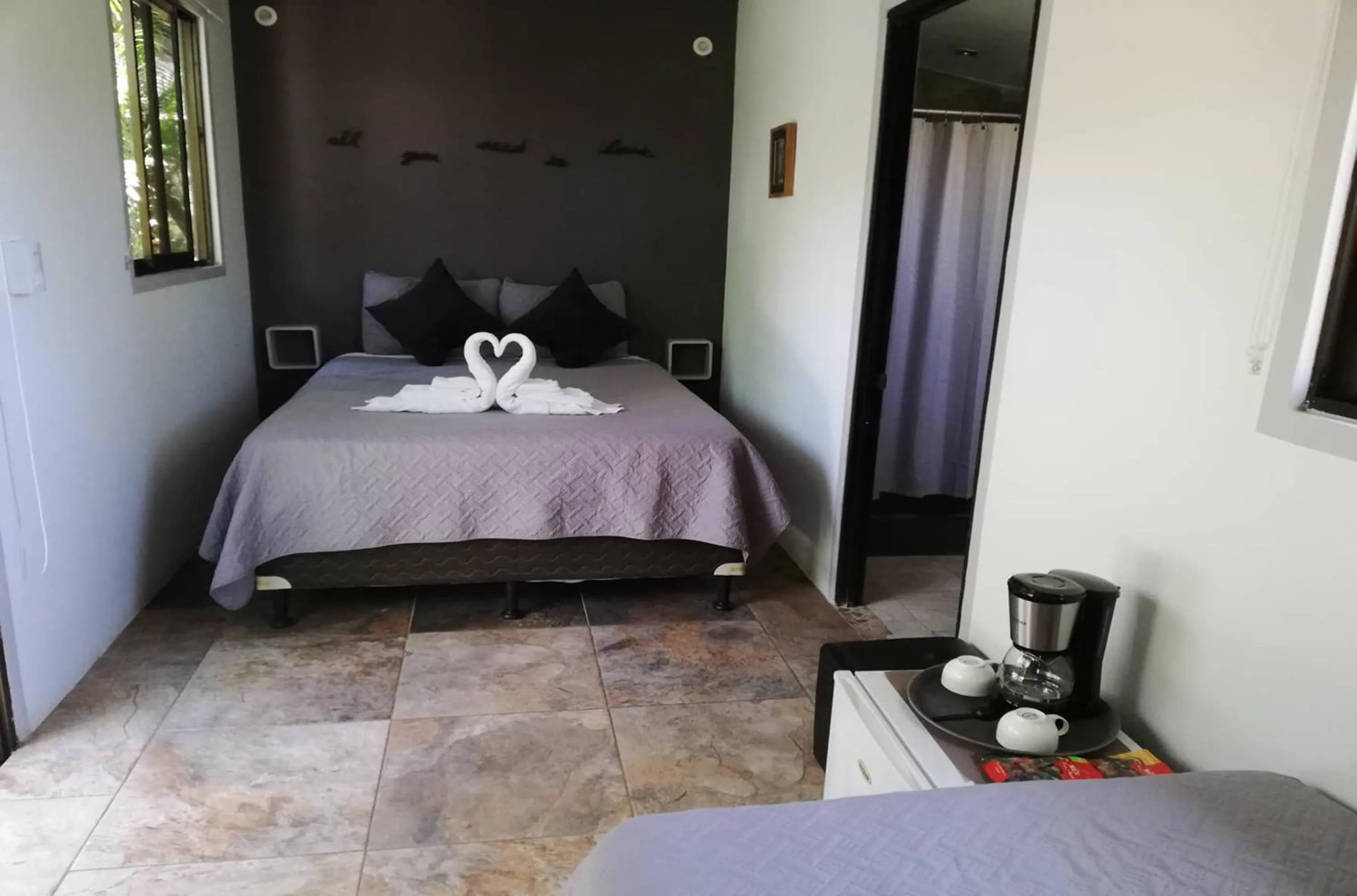 Photo of the whole room, Bed in Green Sanctuary Hotel