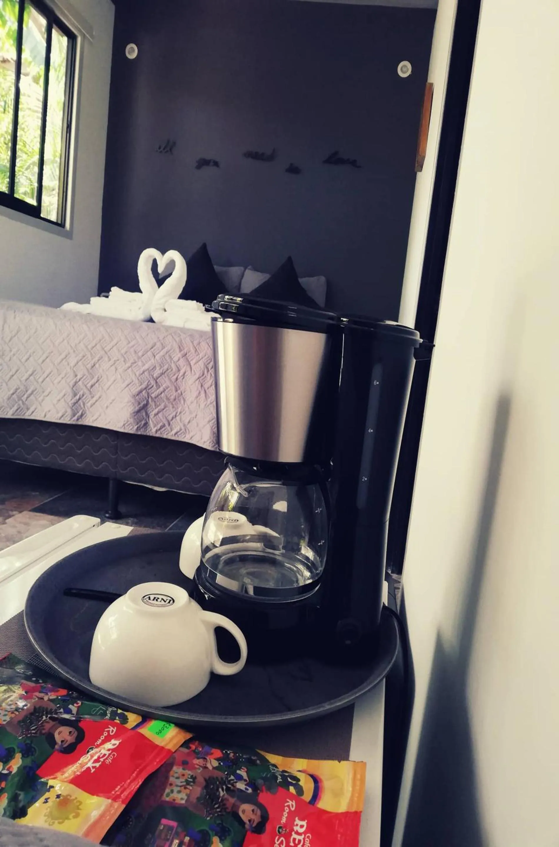 Coffee/tea facilities, Bed in Green Sanctuary Hotel